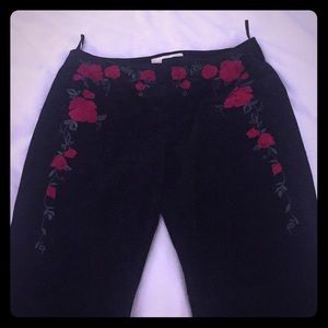 Rose embroidered suede black pants